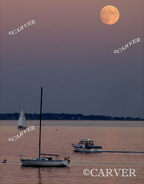 Cruising in Colors
Twilight colors reflecting from the calm waters of Beverly Harbor 
while a near full moon looms overhead.
Keywords: Beverly; moonrise; beach; ocean; photograph; picture; print