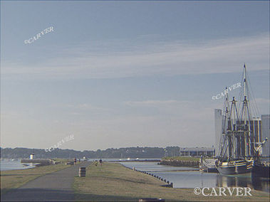 Quiet Times at Derby Wharf 
An early morning scene at Derby Wharf in Salem, MA. The Friendship and the
Derby Wharf lighthouse stretch off into the distance.
Keywords: Derby Wharf; lighthouse; Friendship; salem; morning; photograph; picture